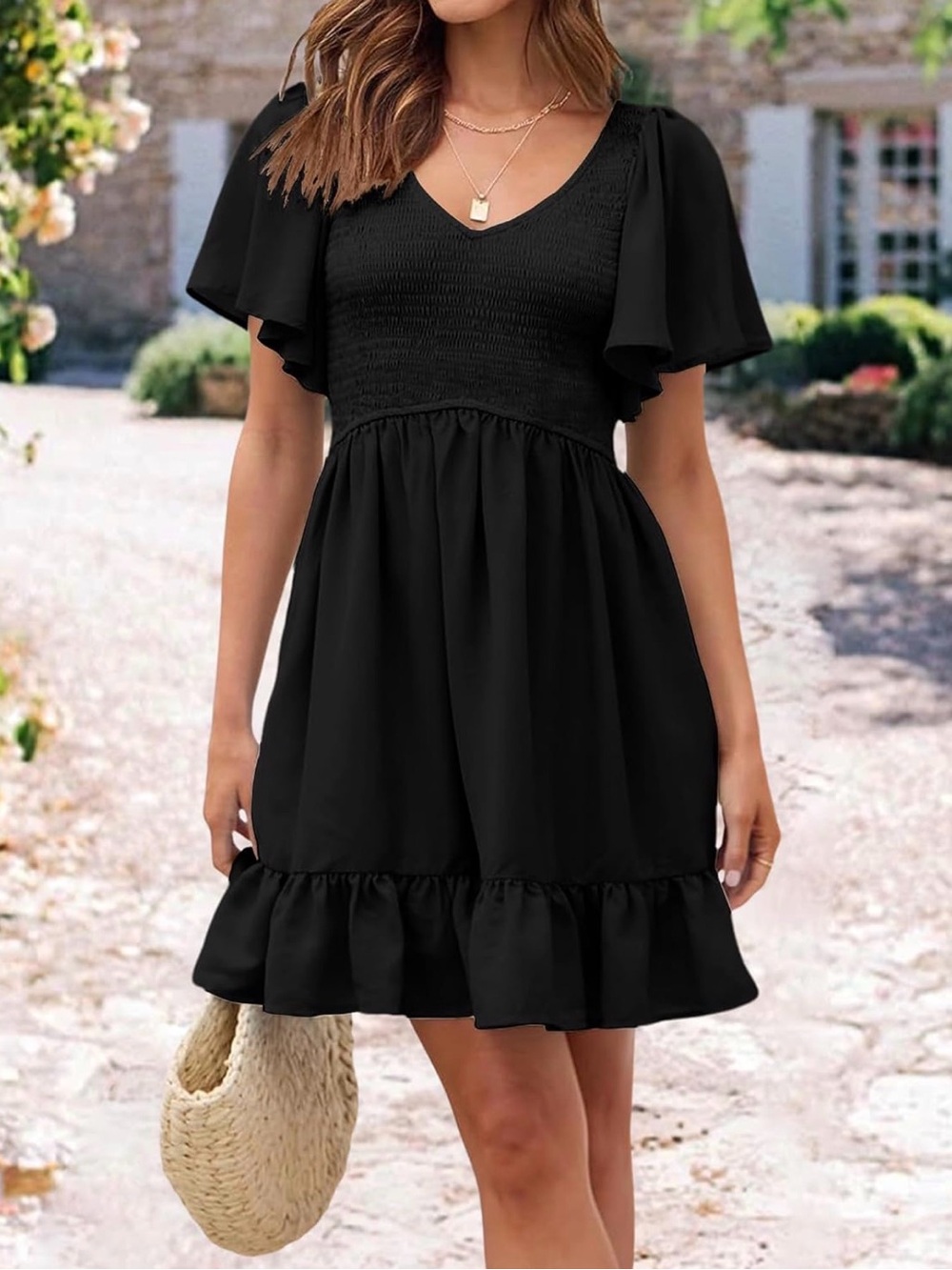 Black Smocked V‑Neck Mini Dress with Flutter Sleeves